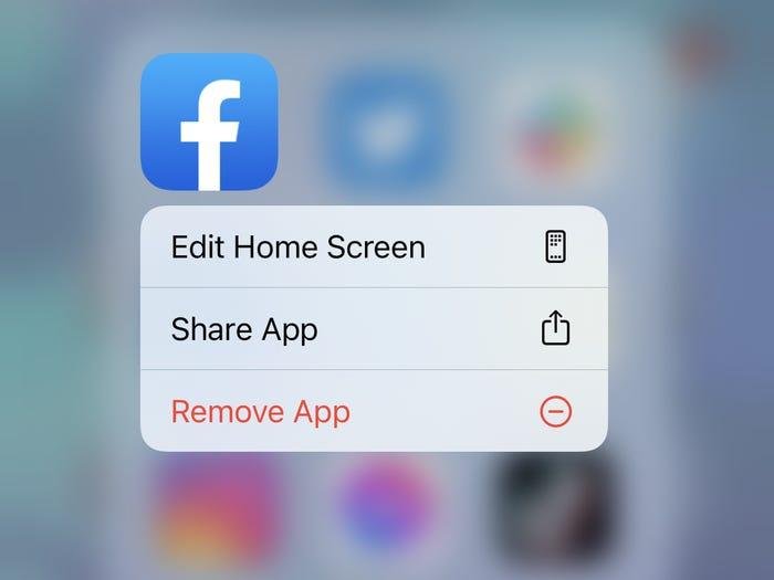 Deleting an app in iOS.]